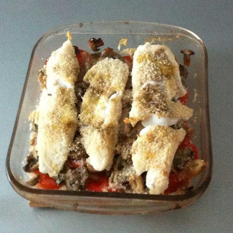 Lieu noir à la tomate et aux champignons