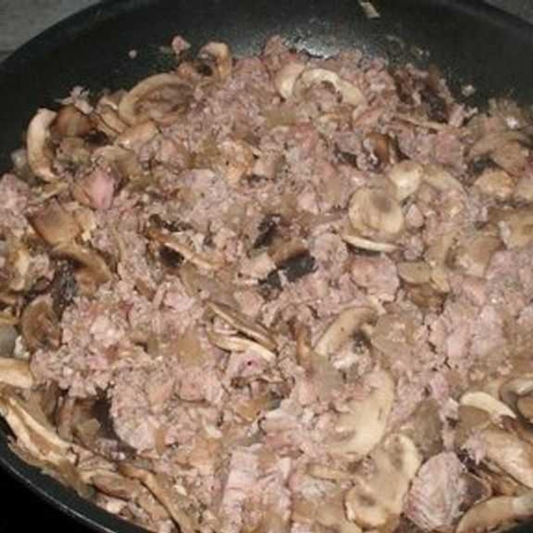 Poêlée d'andouille aux oignons et champignons