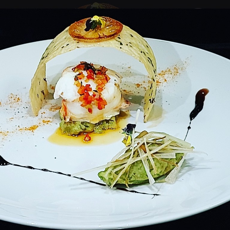 Médaillons de Langouste Fumée aux Herbes de l'Atlas et Citron Confit