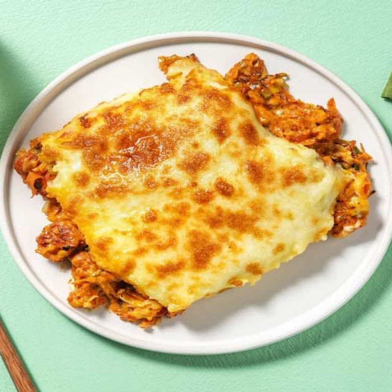 Gegratineerde gehaktschotel met aardappel en mais met prei, Siciliaanse kruiden en geraspte oude kaa