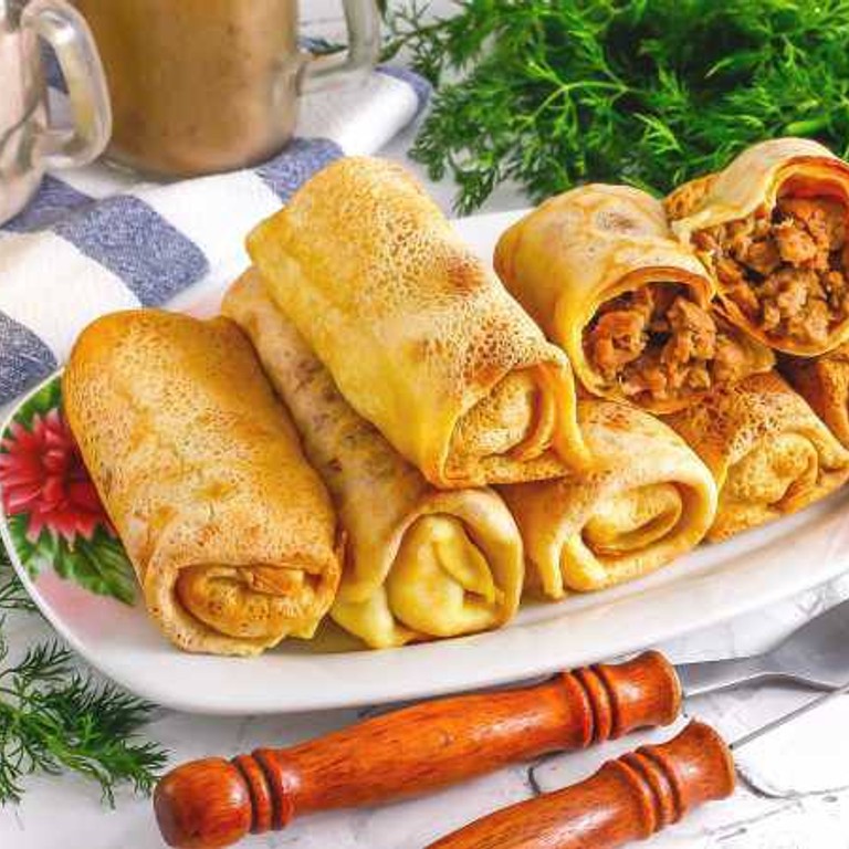 Фаршированные блины с мясом и сыром