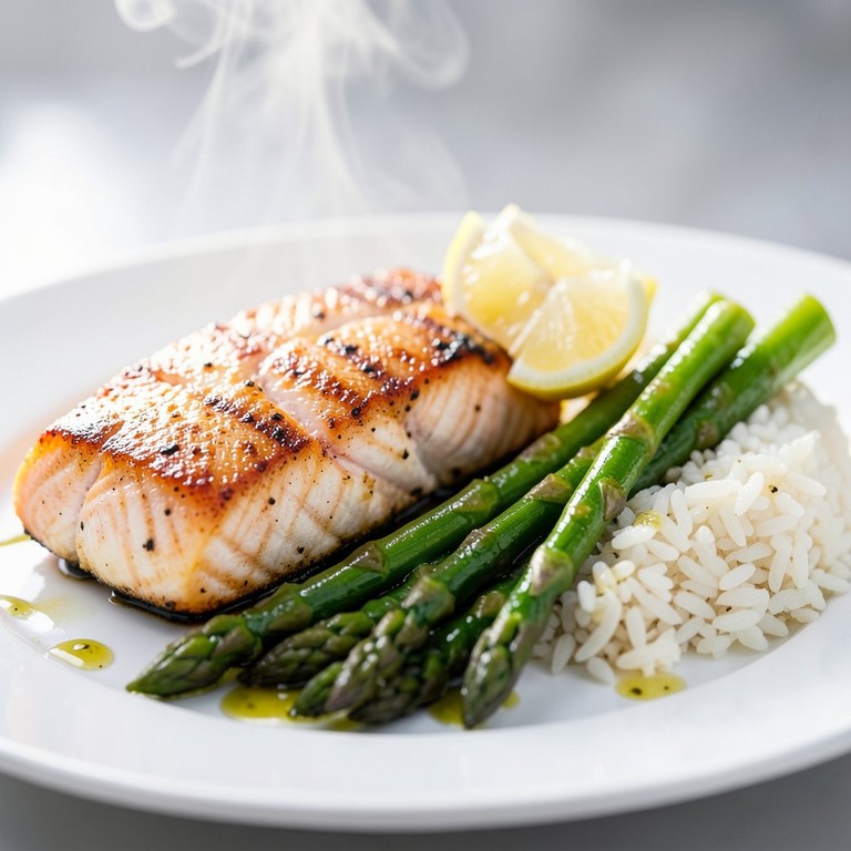 Salmón a la Plancha con Arroz Blanco y Espárragos al Ajillo